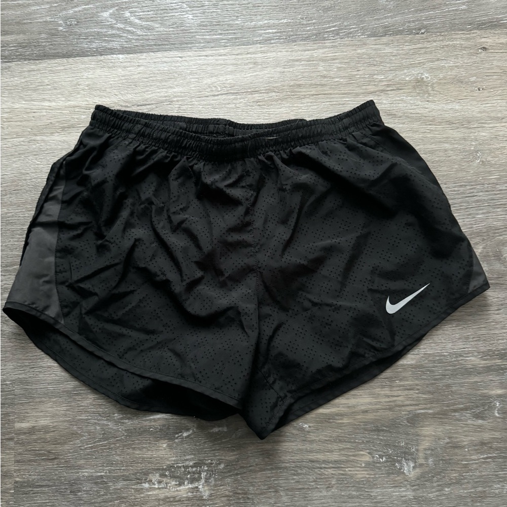 Black Nike running shorts